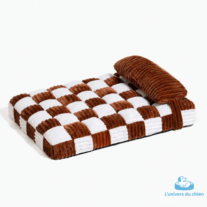 Lit pour chien marron et blanc à motif damier, avec traversin intégré
